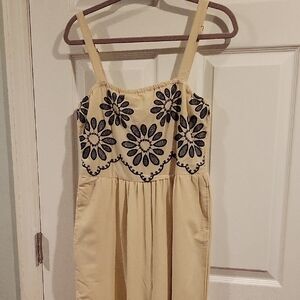 NAOO Beige with black embroidered flower jumpsuit.